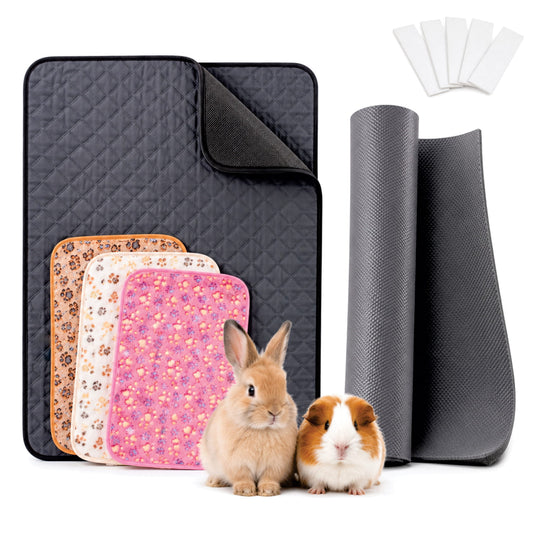 A pet mat set displayed on a white background, including a large dark gray quilted mat, several smaller patterned mats in tan, cream, and pink, two rolled dark gray mats, and a small set of white cleaning cloths. A rabbit and a guinea pig are placed in front of the mats as living subjects.