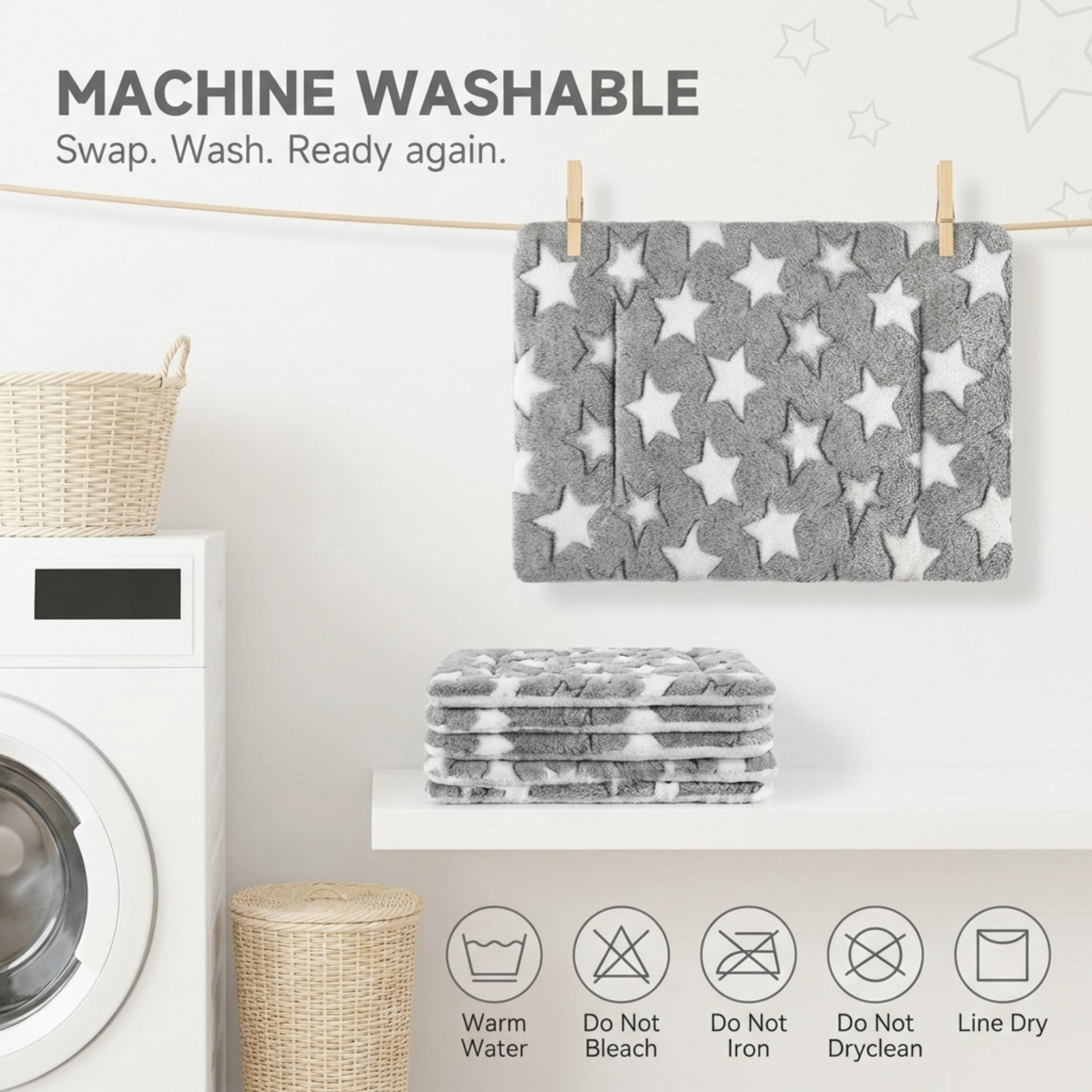 Gray and white star-patterned cloths hanging on a line with washing instructions displayed.